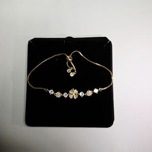 Elegant Gold and Silver Flower Bracelet